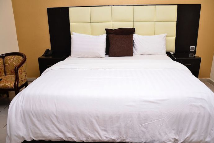 Imagen de la habitación del Hotel Green Suites Villa. Foto 14