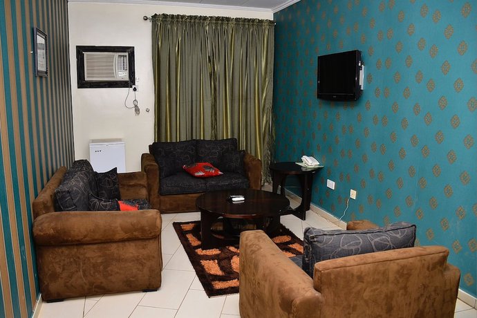 Imagen de la habitación del Hotel Green Suites Villa. Foto 16