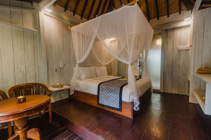 Imagen de la habitación del Hotel Green Taman Ubud. Foto 4