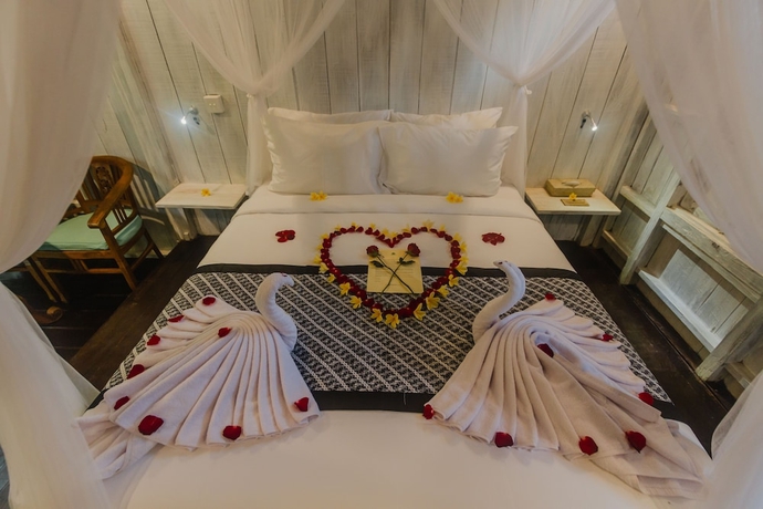 Imagen de la habitación del Hotel Green Taman Ubud. Foto 8