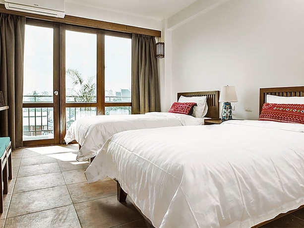 Imagen de la habitación del Hotel Green Tiger House. Foto 5