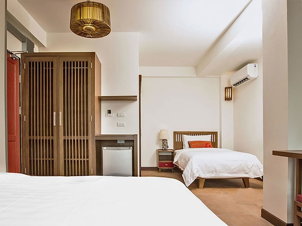 Imagen de la habitación del Hotel Green Tiger House. Foto 7