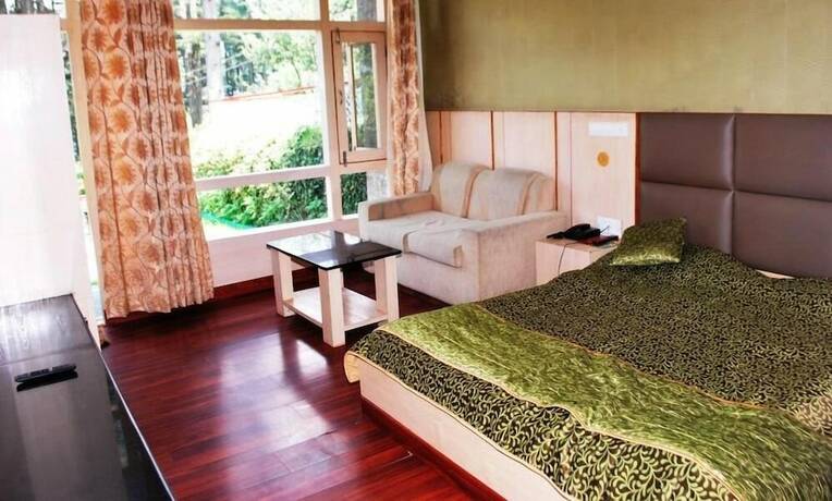 Imagen de la habitación del Hotel Green Top. Foto 7