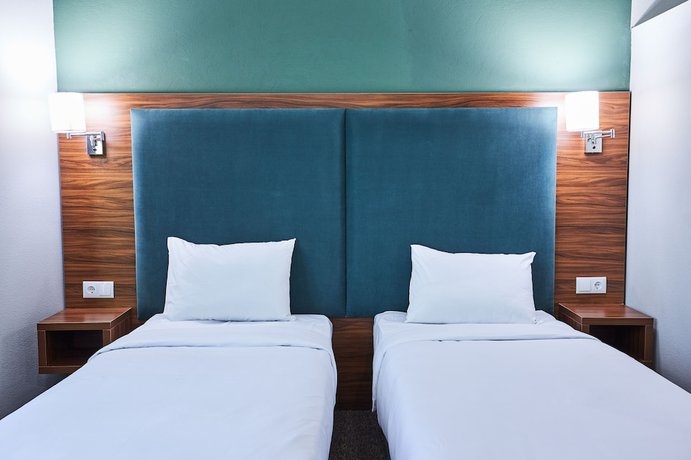 Imagen de la habitación del Hotel Green Tower. Foto 8