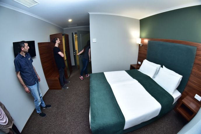 Imagen de la habitación del Hotel Green Tower. Foto 13