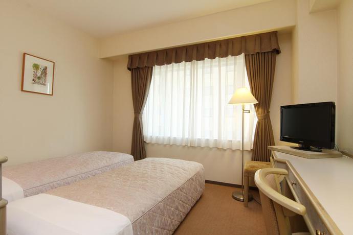 Imagen de la habitación del Hotel Green Tower Makuhari. Foto 7