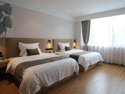 Imagen general del Hotel Green Tree Inn Express Danyang Wuyue Square Railway Station. Foto 9