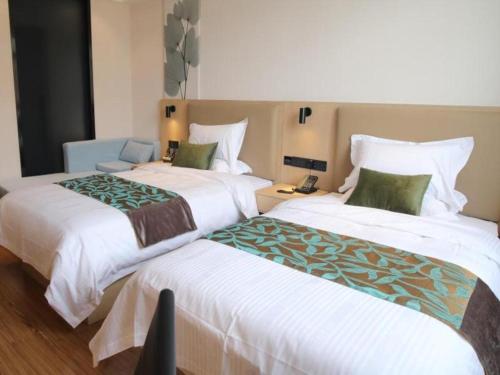 Imagen general del Hotel Green Tree Inn Express Danyang Wuyue Square Railway Station. Foto 12