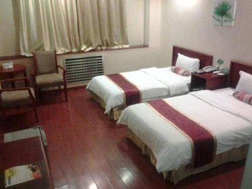 Imagen de la habitación del Hotel Green Tree Inn Express. Foto 6