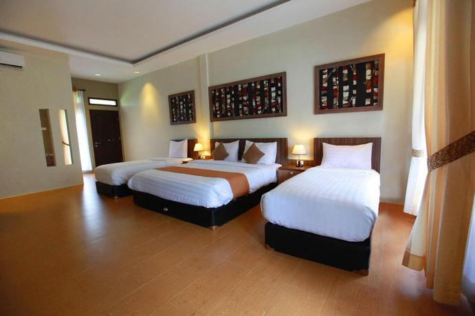 Imagen de la habitación del Hotel Green Tropical Village Belitung. Foto 16