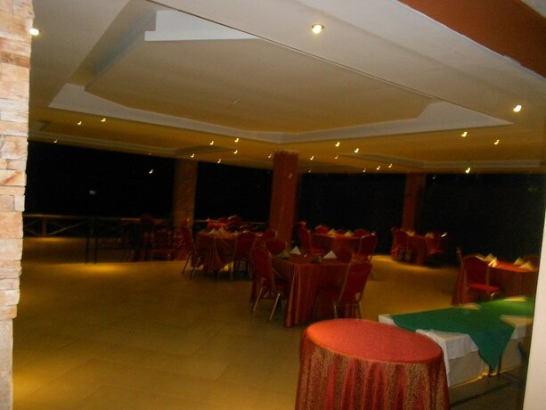 Imagen del bar/restaurante del Hotel Green Valley, Kampala. Foto 14