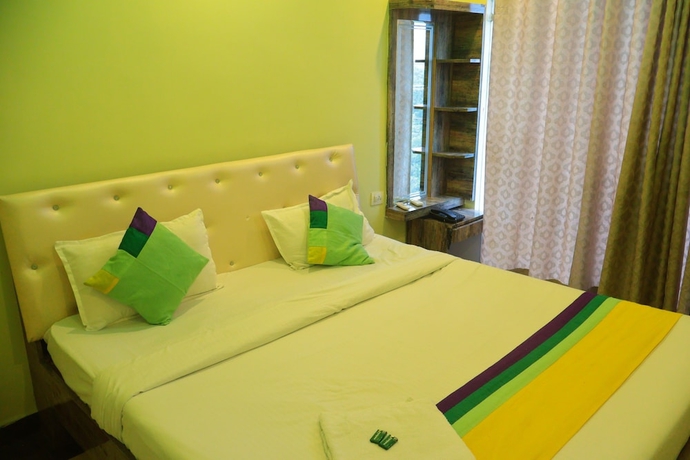 Imagen de la habitación del Hotel Green Valley Palace. Foto 7