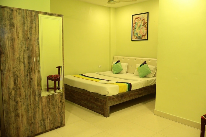 Imagen de la habitación del Hotel Green Valley Palace. Foto 12