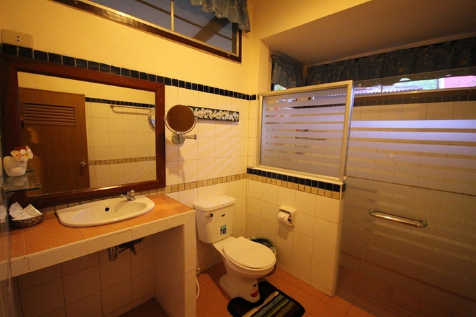 Imagen de la habitación del Hotel Green View Village Resort. Foto 4