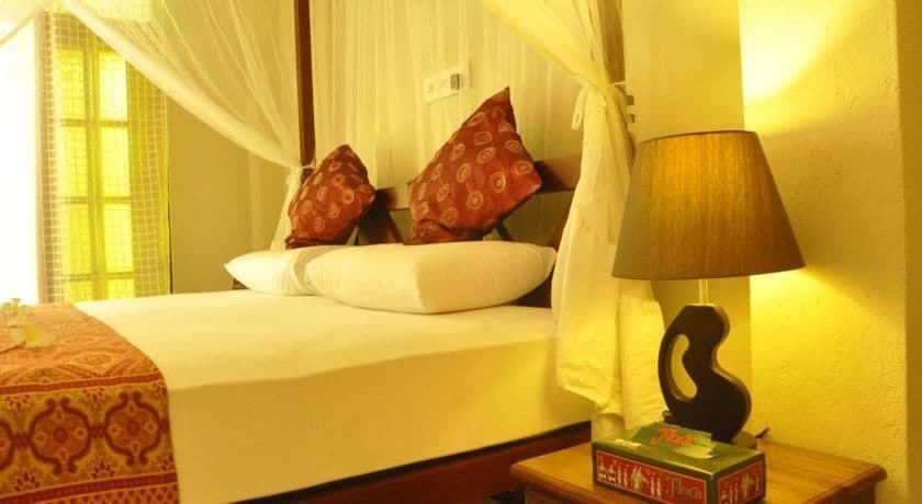 Imagen de la habitación del Hotel Green Villa. Foto 9