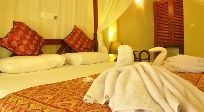 Imagen de la habitación del Hotel Green Villa. Foto 10