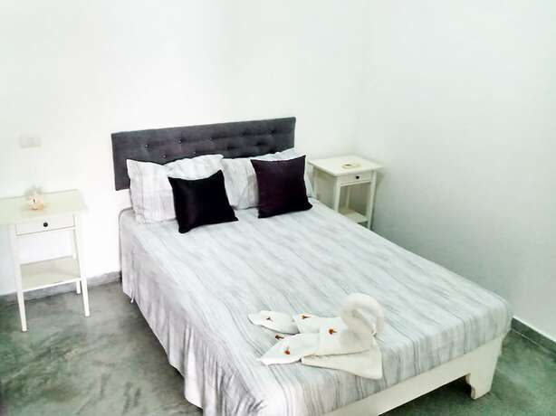 Imagen de la habitación del Hotel Green Village Bayahibe. Foto 20