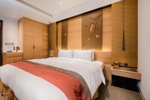 Imagen de la habitación del Hotel Green World Grand Nanjing. Foto 6