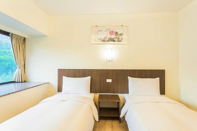 Imagen de la habitación del Hotel Green World Sansui. Foto 24