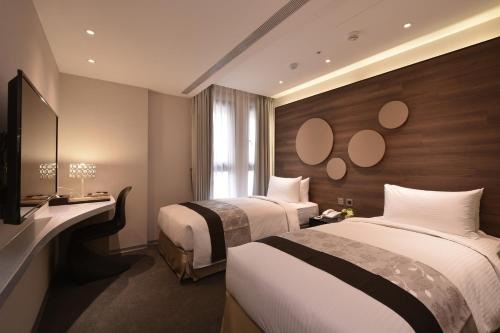Imagen de la habitación del Hotel Green World Songshan. Foto 7