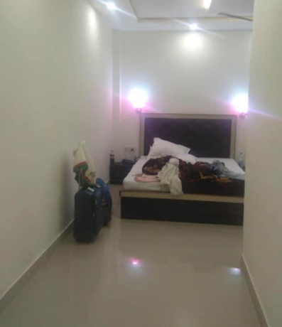 Imagen de la habitación del Hotel Green house Homestay. Foto 14