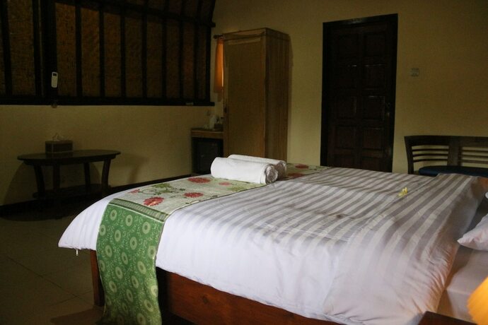 Imagen de la habitación del Hotel Green orry inn cafe and cottages. Foto 16