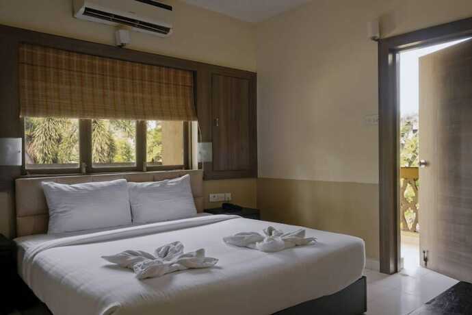 Imagen de la habitación del Hotel Green valley beach resort. Foto 15