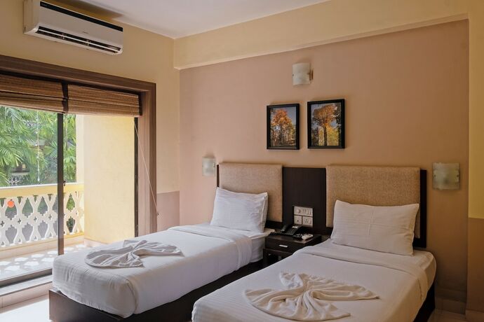 Imagen de la habitación del Hotel Green valley beach resort. Foto 17