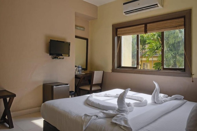 Imagen de la habitación del Hotel Green valley beach resort. Foto 18