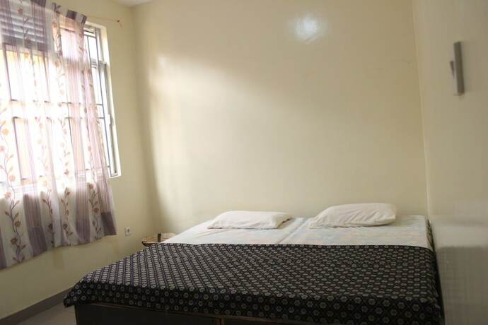 Imagen de la habitación del Hotel GreenPage Garden Suites. Foto 12