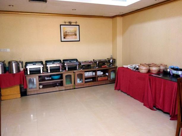 Imagen del bar/restaurante del Hotel GreenTree Aliiance Huayang Hotel. Foto 4