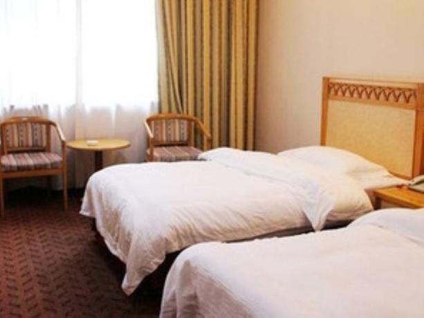 Imagen de la habitación del Hotel GreenTree Aliiance Huayang Hotel. Foto 6