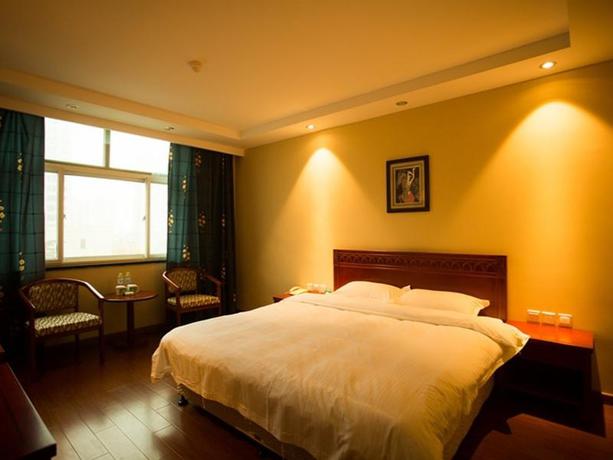 Imagen de la habitación del Hotel GreenTree Aliiance Huayang Hotel. Foto 10