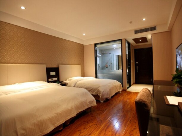 Imagen de la habitación del Hotel GreenTree Alliance YanTai YingChun Street Green Homeland Hotel. Foto 17