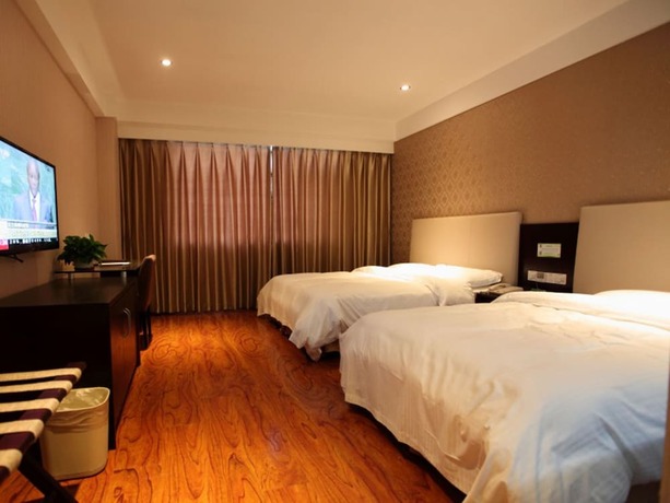 Imagen de la habitación del Hotel GreenTree Alliance YanTai YingChun Street Green Homeland Hotel. Foto 21