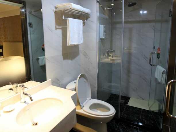 Imagen de la habitación del Hotel GreenTree Alliance YanTai YingChun Street Green Homeland Hotel. Foto 25