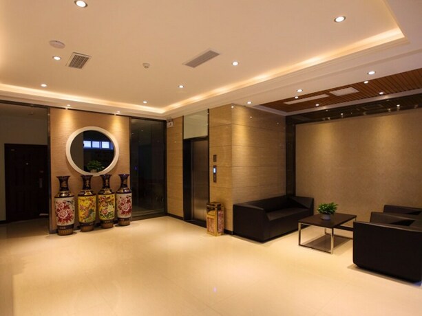 Imagen de los interiores del Hotel GreenTree Alliance YanTai YingChun Street Green Homeland Hotel. Foto 33