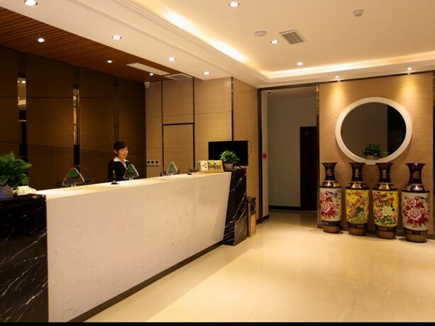 Imagen de los interiores del Hotel GreenTree Alliance YanTai YingChun Street Green Homeland Hotel. Foto 35