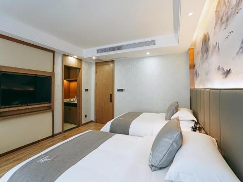 Imagen de la habitación del Hotel GreenTree Eastern Anshun Anshun Zhenning Huangguoshu. Foto 13