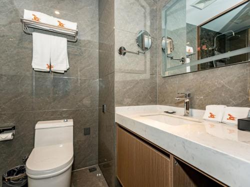 Imagen de la habitación del Hotel GreenTree Eastern Bengbu Huaishang Guogou Plaza Lijing Tiancheng. Foto 13