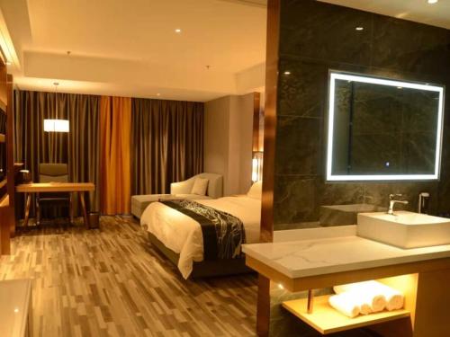 Imagen de la habitación del Hotel GreenTree Eastern Dezhou Qingyun Yingcai Road Financial Building. Foto 20