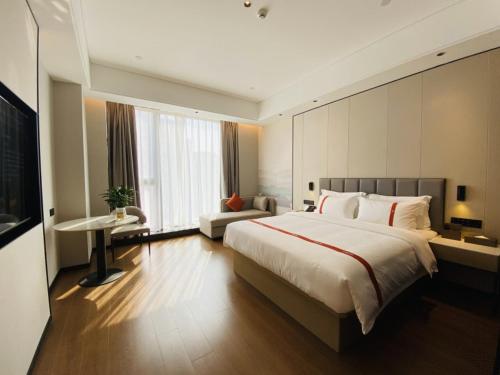 Imagen de la habitación del Hotel GreenTree Eastern Fuzhou South Railway Station. Foto 15