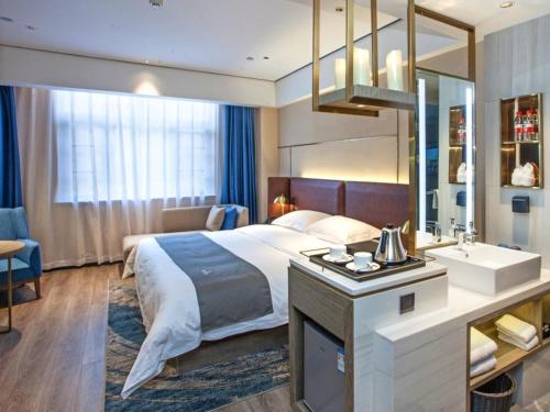 Imagen de la habitación del Hotel GreenTree Eastern Hengyang High-Tech Zone Hengzhou Hengzhou Fu. Foto 20