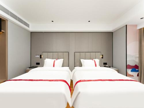 Imagen de la habitación del Hotel GreenTree Eastern Jinan West Station International Convention and Exhibition Center. Foto 16