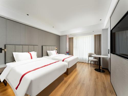 Imagen de la habitación del Hotel GreenTree Eastern Jinan West Station International Convention and Exhibition Center. Foto 20