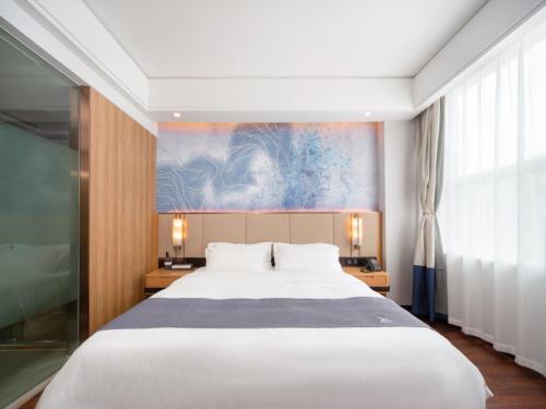 Imagen de la habitación del Hotel GreenTree Eastern Lihu Yuantouzhu Scenic Area. Foto 14