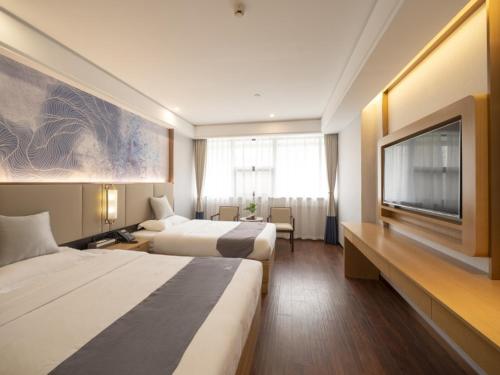 Imagen de la habitación del Hotel GreenTree Eastern Lihu Yuantouzhu Scenic Area. Foto 15