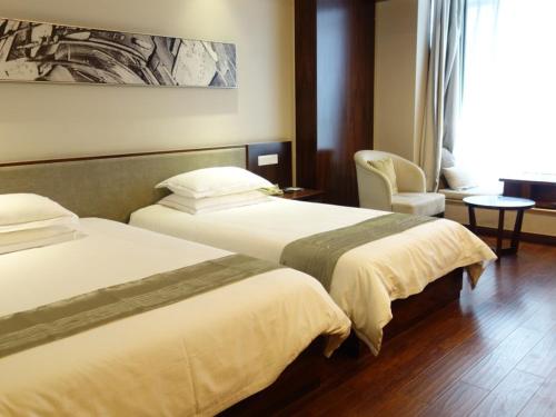 Imagen de la habitación del Hotel GreenTree Eastern Lihu Yuantouzhu Scenic Area. Foto 16