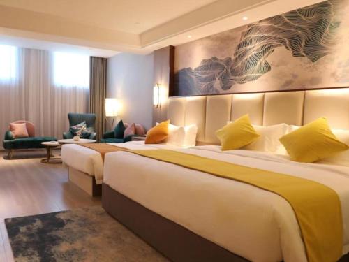 Imagen de la habitación del Hotel GreenTree Eastern Taizhou Gaogang North Yangzijiang Road Mingfa Plaza. Foto 7