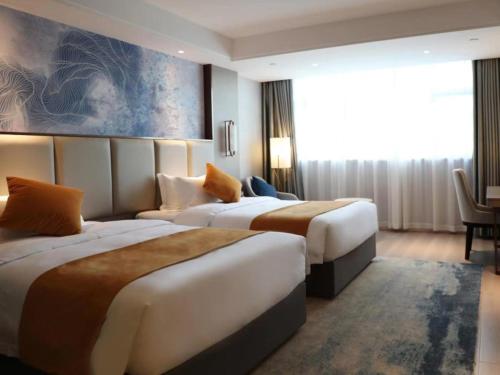 Imagen general del Hotel GreenTree Eastern Taizhou Gaogang North Yangzijiang Road Mingfa Plaza. Foto 3